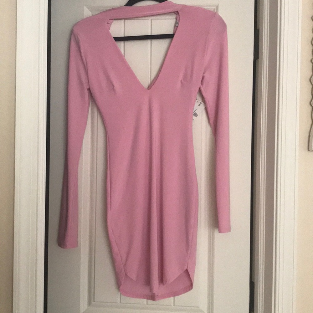 Pink open neck mini dress.